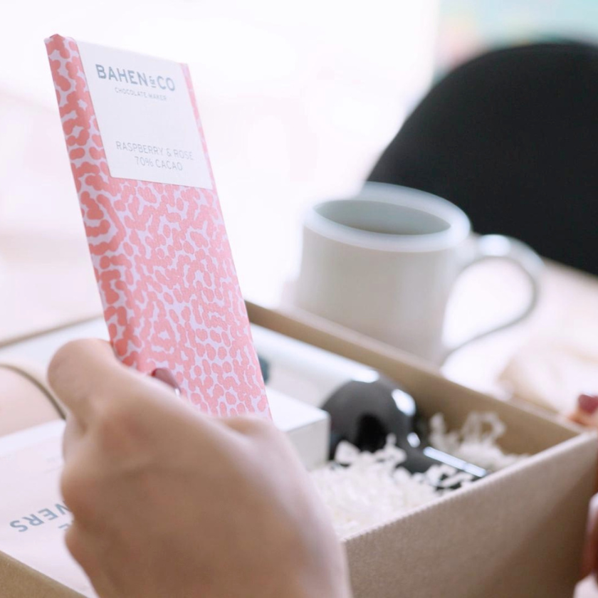  A gift box that has been delivered in Australia and being opened by the receiver.